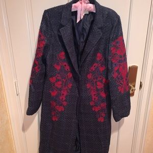 Tory Burch navy blue trench coat with red appliqué